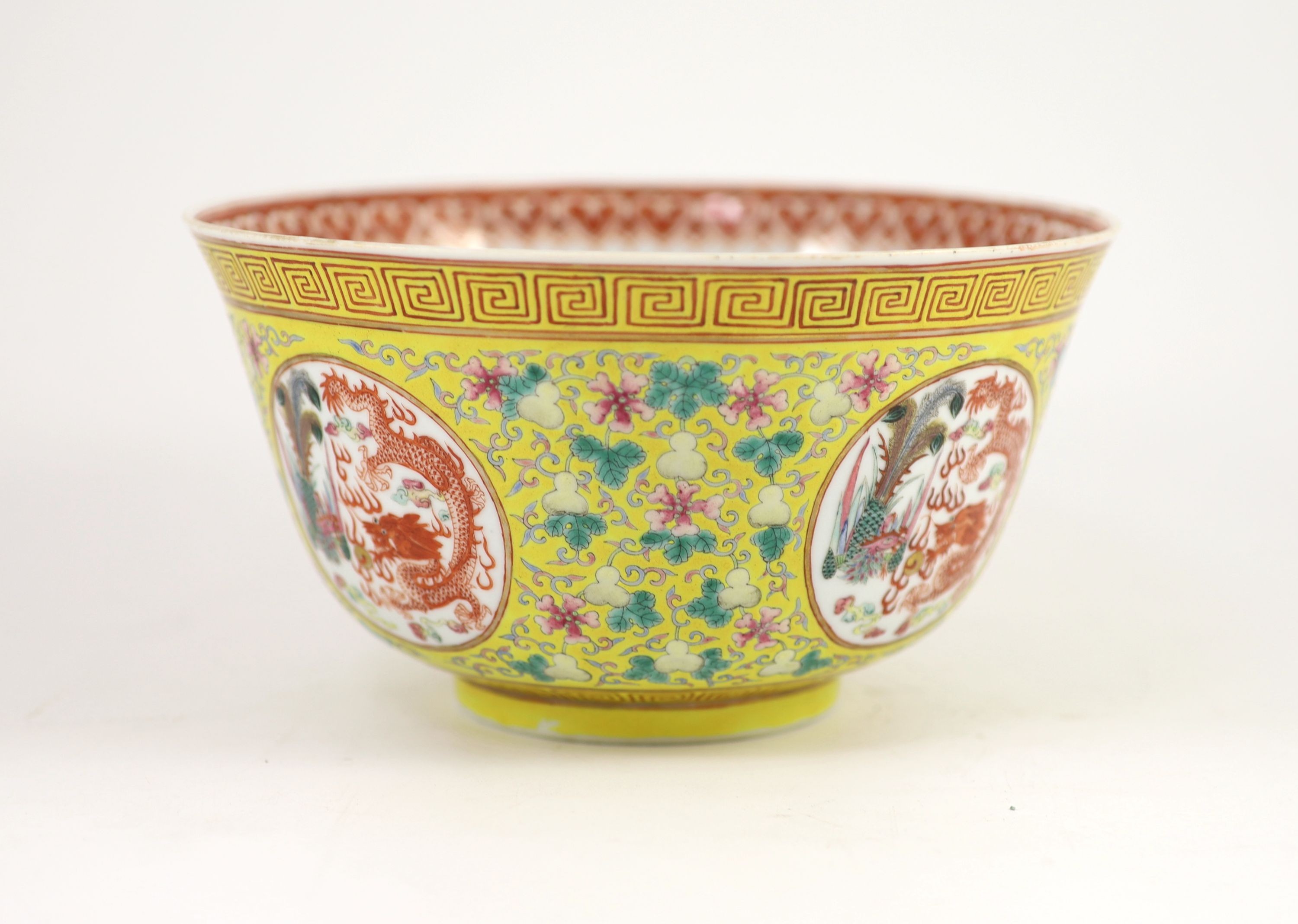 A fine Chinese yellow ground 'dragon and phoenix' medallion deep bowl, Guangxu mark and period (1875-1908), 20.6 cm diameter, 11.2 cm high, gilding to rim worn